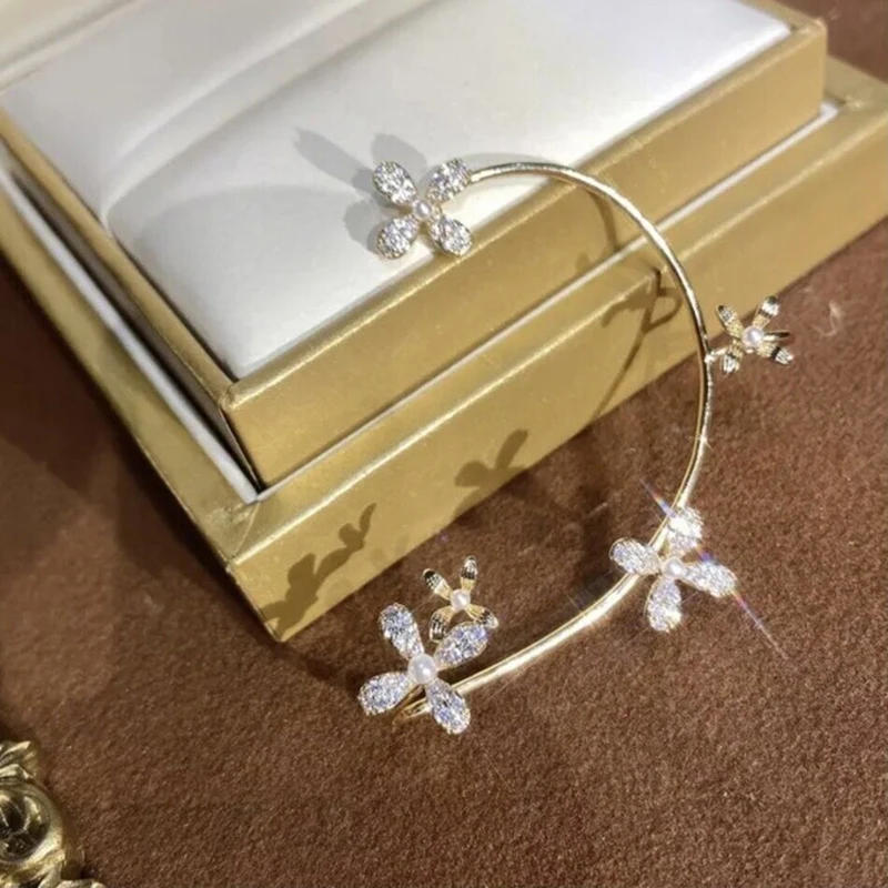 ​Flower and Snow Flake Ear Cuff Collection